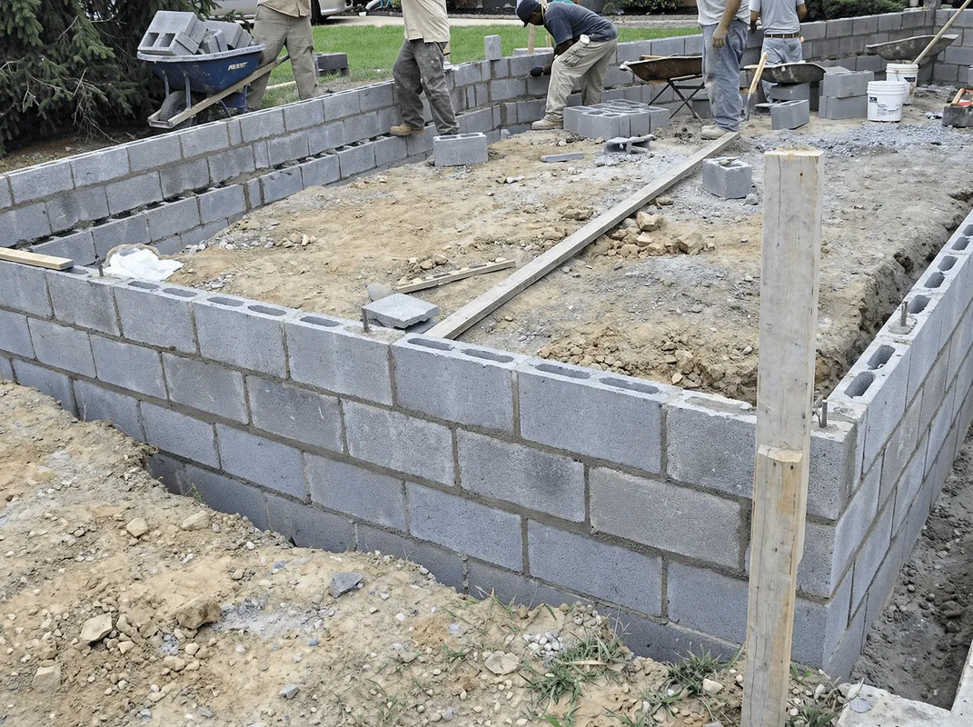 Professionals building a foundation with blocks in New Haven, CT